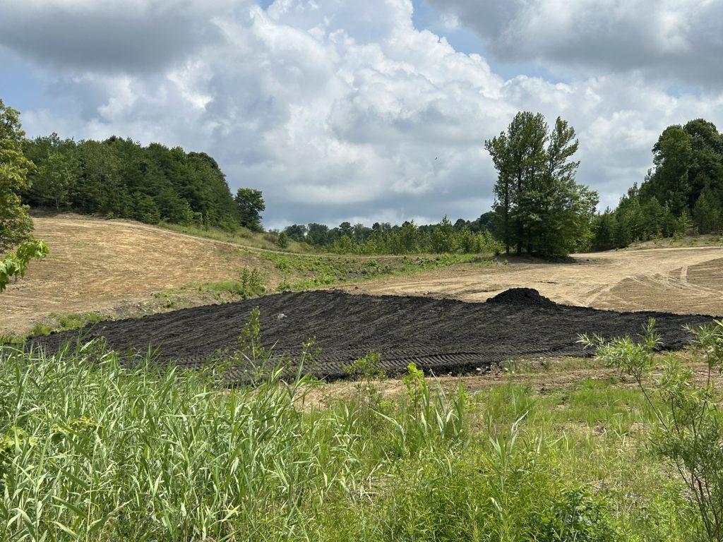 Backfill material on reclaimed mined land
