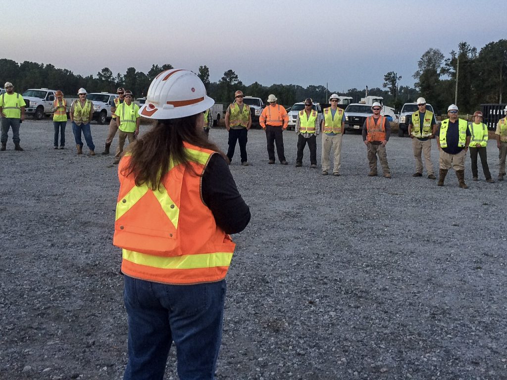 Safety team meeting on jobsite